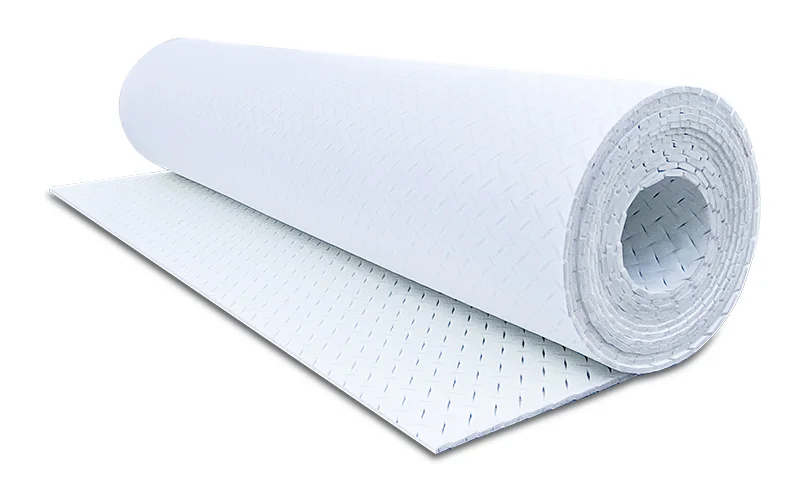 Couche de souplesse pour gazon synthétique